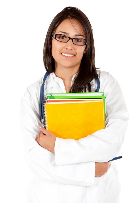 female student smiling with notebooks isolated over a white background