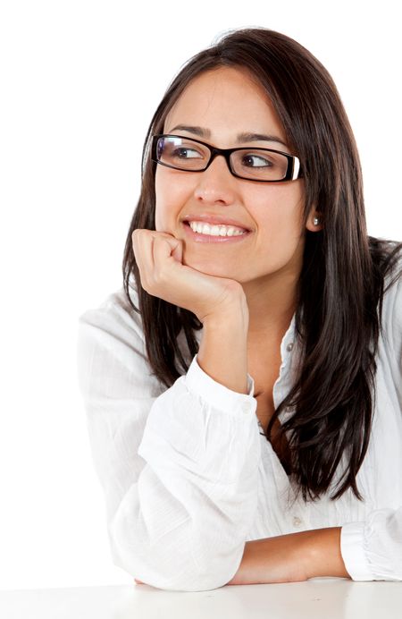 casual woman smiling and leaning on her hand isolated over a white background