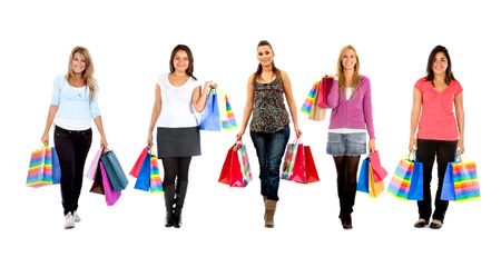 Women  standing with shopping bags - isolated over a white background
