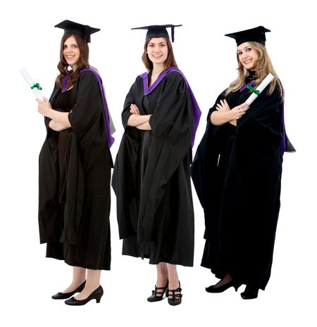 Group of women in their graduation gown - isolated over a white background
