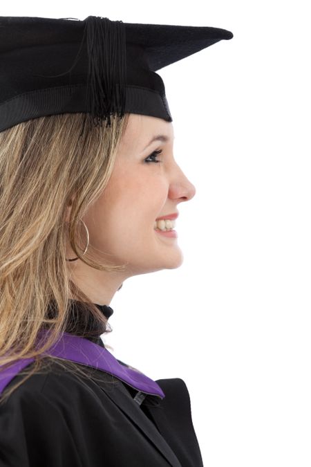 Graduation woman smiling isolated over a white background