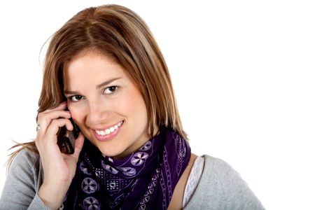 Woman talking on the phone isolated over a white background