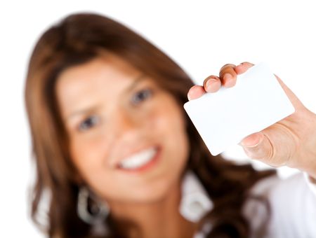 Woman with a business card isolated over a white background