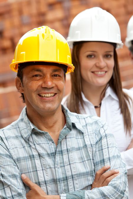 Group of architects and engineers at a construction site