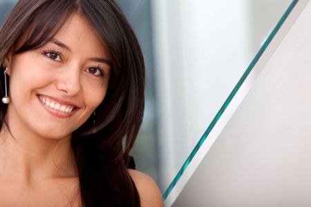 Beautiful business woman smiling at the office