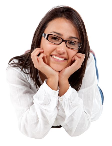 casual woman smiling and leaning on her hands isolated over a white background
