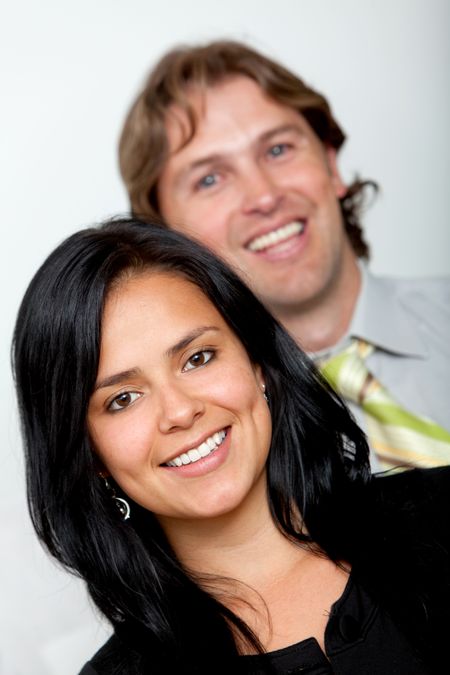 Businesswoman with her partner smiling at the office