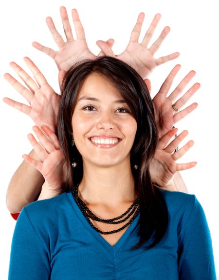 Fun girl with a crown of hands isolated over a white background