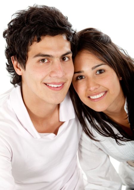 Beautiful couple portrait looking happy isolated on white