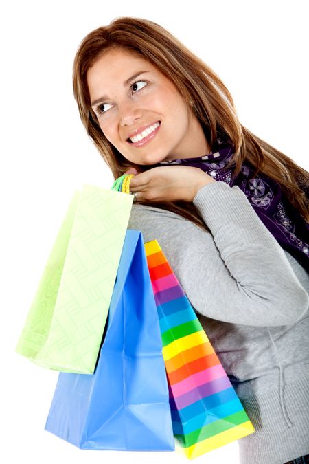 Beautiful shopping woman isolated over a white background