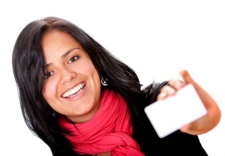 woman smiling and holding a credit card isolated on white
