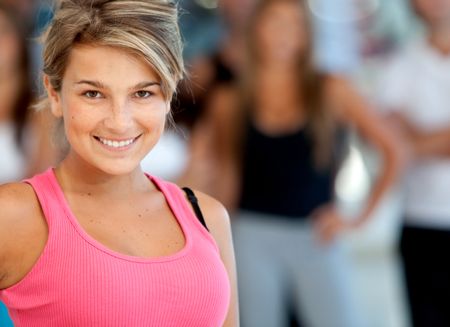 beautiful woman portrait at the gym smiling