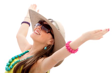 Summery woman wearing a hat and sunglasses isolated over white