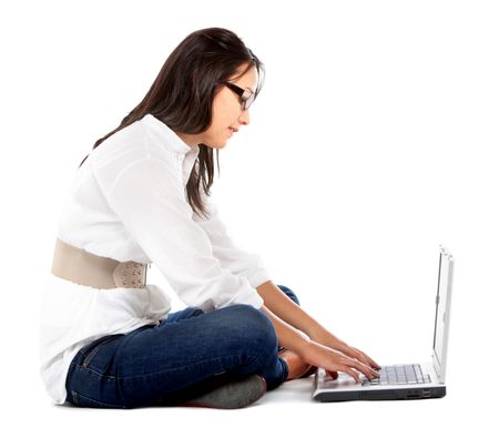 Woman working on a laptop isolated over a white background