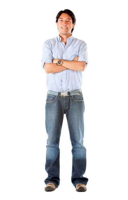 Casual man standing isolated over a white background