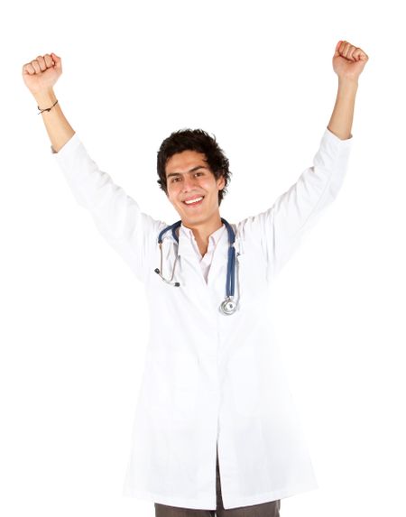 Happy male doctor with arms up isolated over a white background