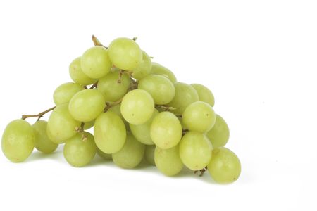 green grapes over a white background