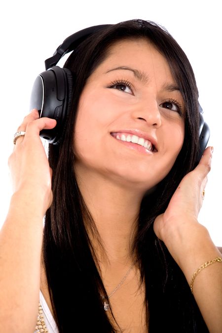 girl listening to music looking happy over white