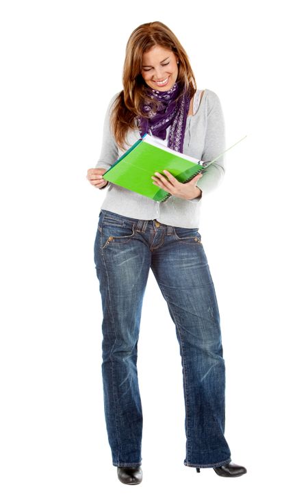 Female student with a notebook isolated over a white background