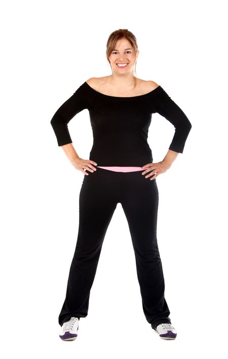 Fit woman in sportswear isolated over a white background