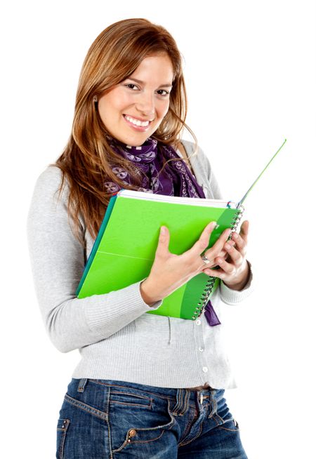 Beautiful female student with a notebook isolated over a white background