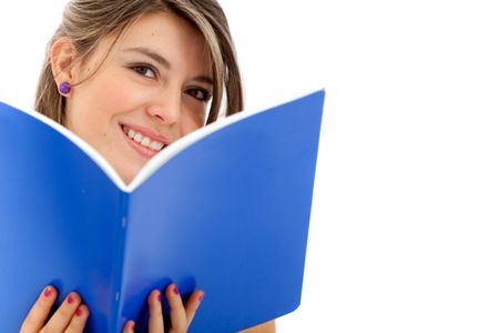Beautiful female student holding a notebook isolated over white