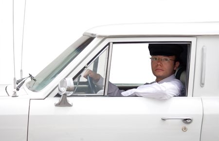 limousine driver inside the car over a blue sky