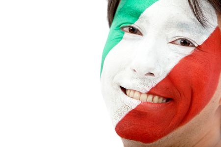 Portrait of a male with an italian flag painted on his face