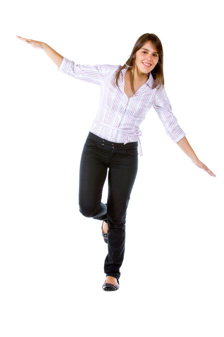 Business woman balancing isolated over a white background