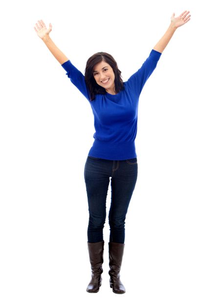 Happy woman with arms up isolated over a white background
