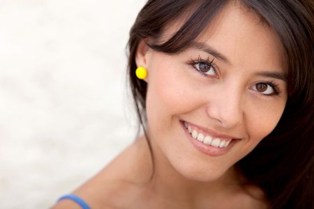 Portrait of a beautiful woman indoors smiling