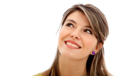 Beautiful pensive young woman isolated over a white background