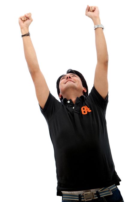 Excited man with arms up isolated over a white background