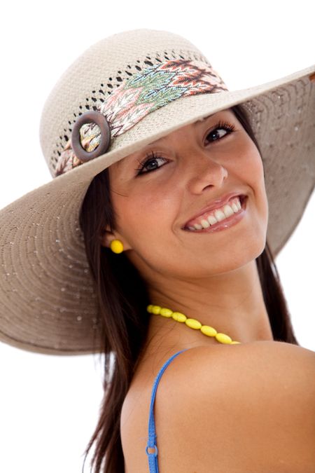Summer woman wearing a hat and smiling isolated over a white background