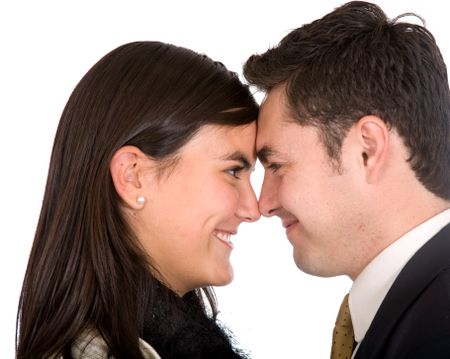 business young lovers over a white background face to face