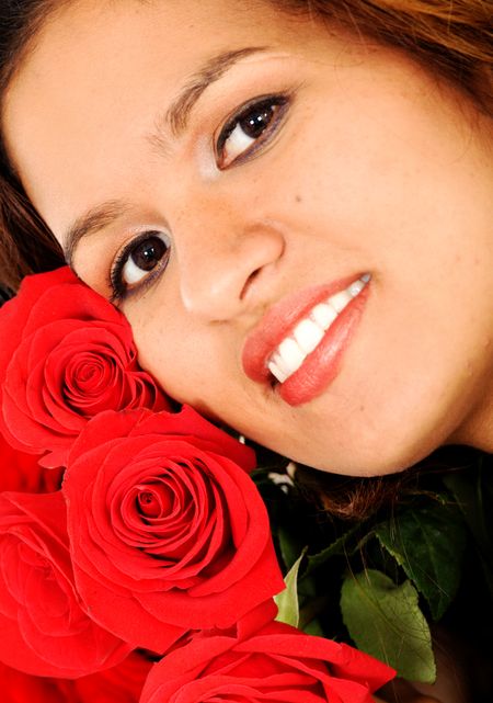 beautiful female portrait smiling with red roses