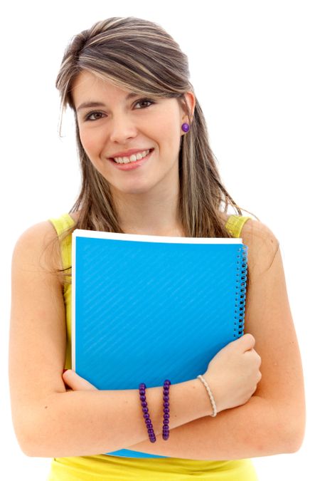 Beautiful female student holding a notebook - isolated over white