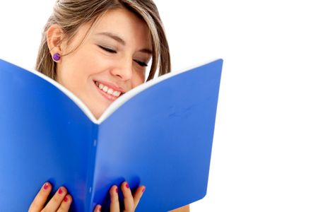 Female student reading a book isolated over a white background