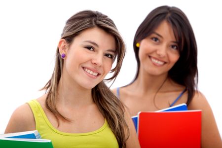 Beautiful female students with notebooks isolated over a white background