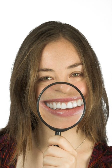 humorous photo of a casual woman with a big smile