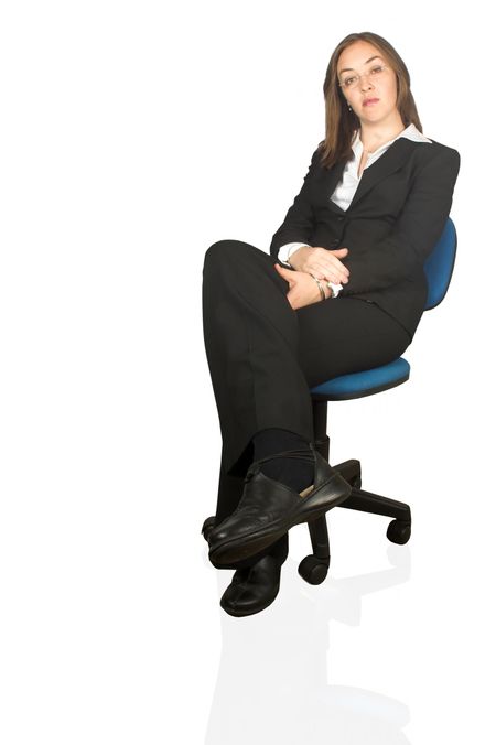 business woman with a confident look sitting on a chair, isolated