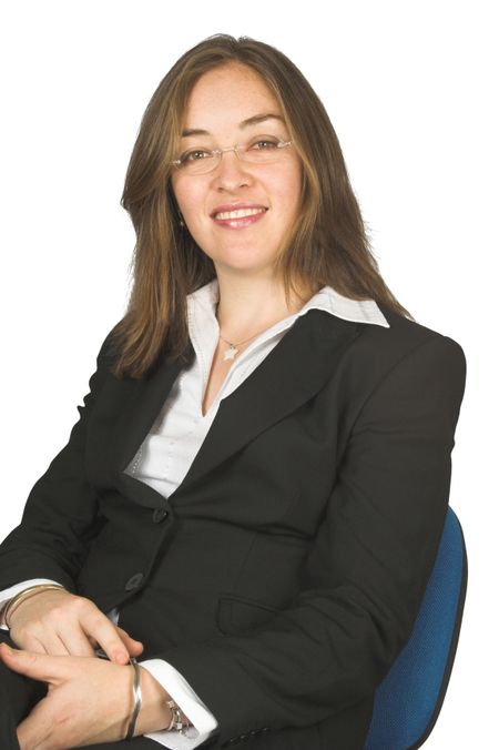 business woman with glasses sitting on a chair
