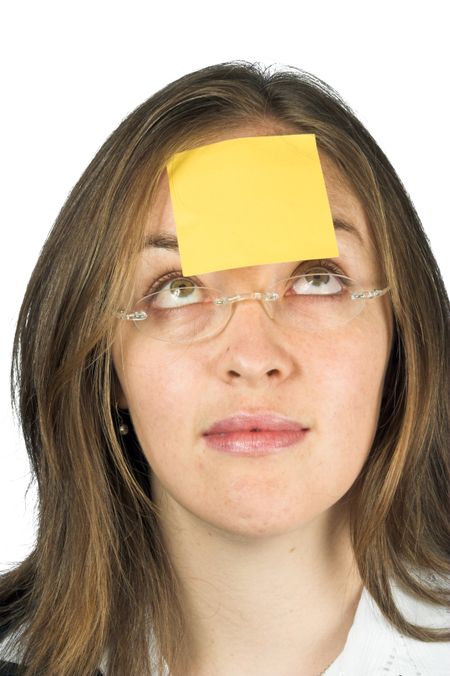 business woman with a post-it note on her forehead