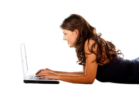 Beautiful woman working on a laptop isolated over a white background