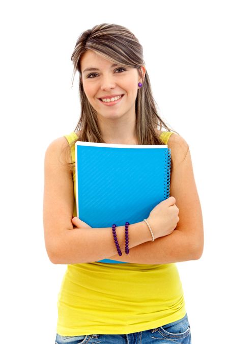 Beautiful female student holding a notebook - isolated over a white background