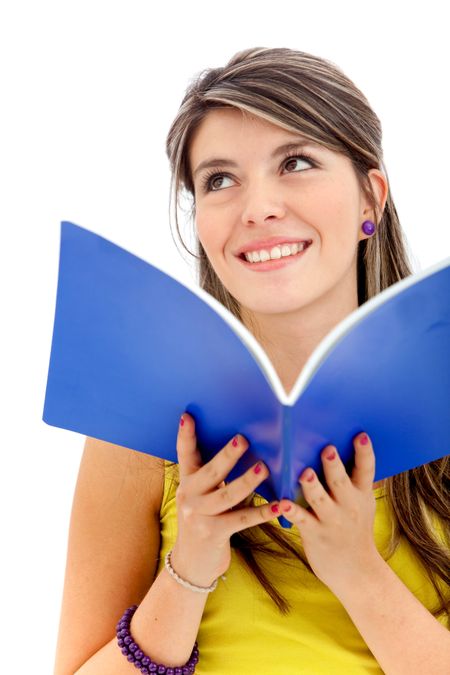 Thoughtful female student holding a notebook - isolated over a white background