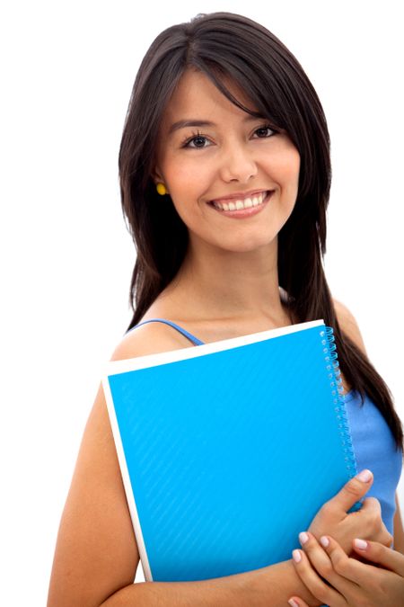 Beautiful female student holding a notebook - isolated over a white background