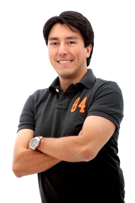 Casual man with arms crossed and smiling - isolated over white