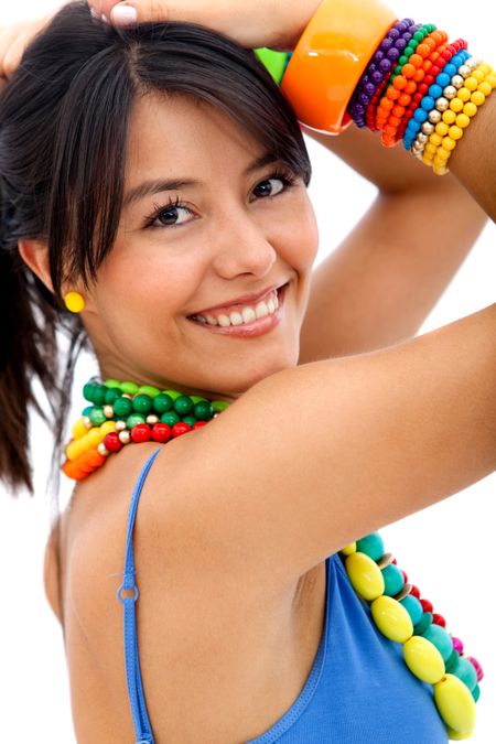 Woman with colorful accessories smiling - isolated over a white background