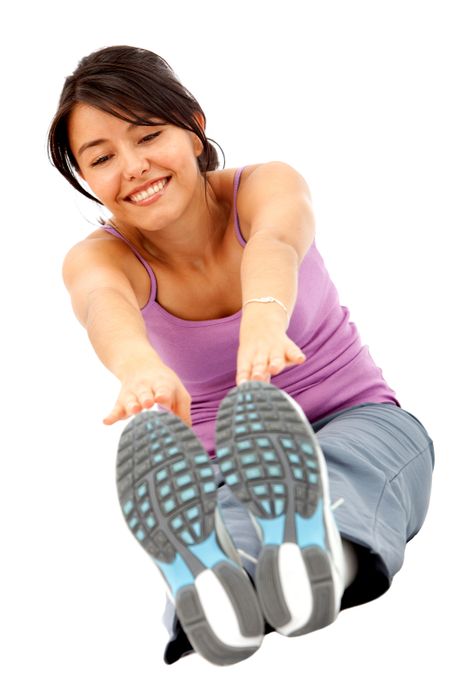 Fit woman stretching - isolated over a white background